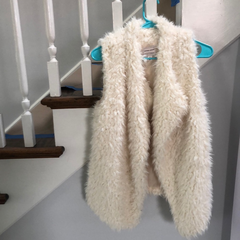 White faux fur vest